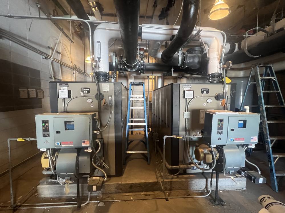 RK Hunter providing boiler installation and technical assistance in the field